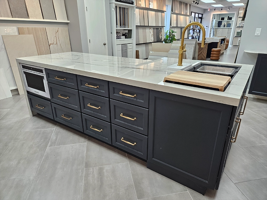 Cabinetry island with finish and countertop samples in the Unique BKB showroom