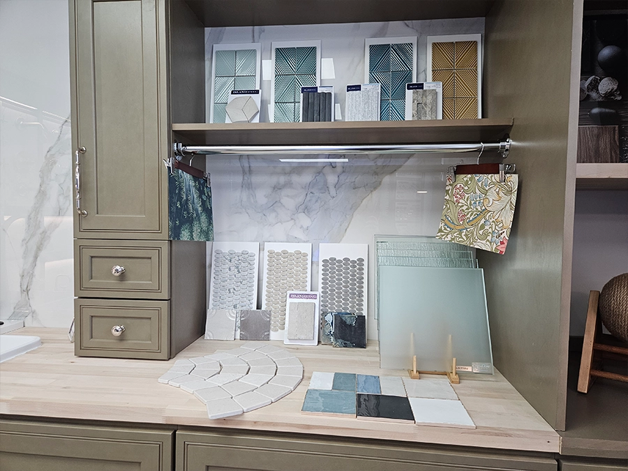 Coordinated tile, color and finish samples arranged in the Unique BKB showroom